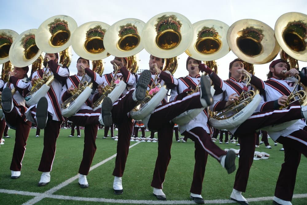 Masks, Brass, and Marching Band